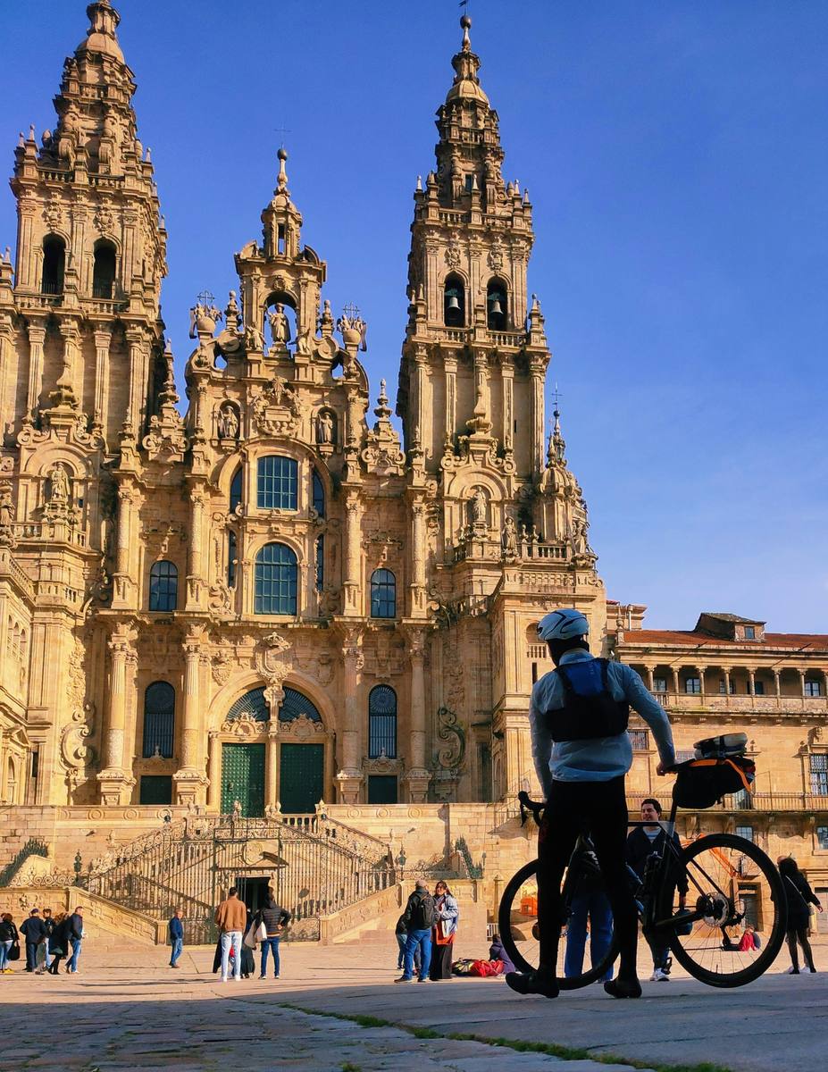 Pilgrims gathered on Praza do Obradoiro before Santiago cathedral, the scene that swells in a Holy Year